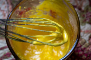 drizzle a LITTLE oil while beating and watch for emulsification