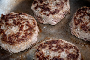 maple cardamom sausage in the fry pan