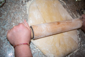 rolling folded croissant dough